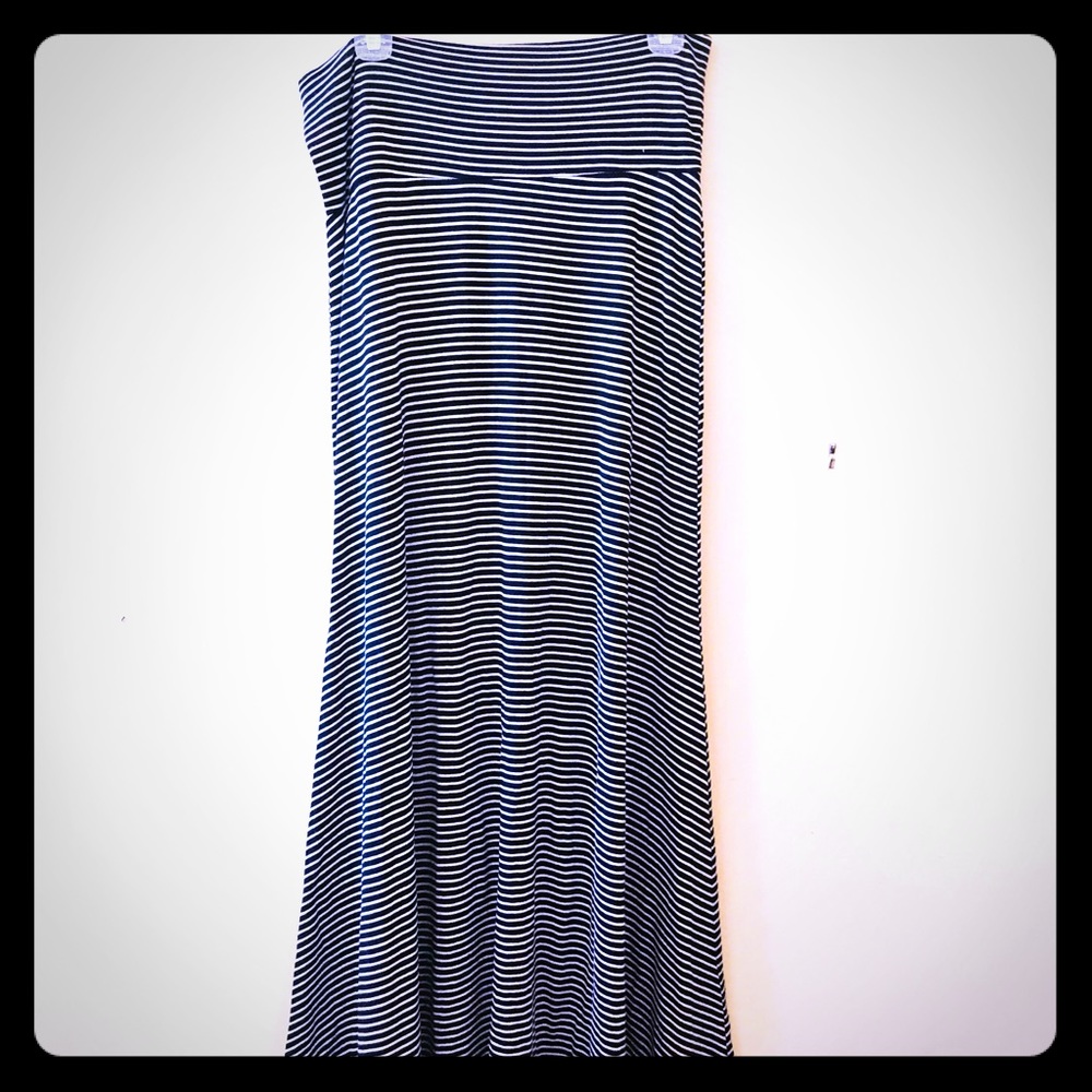 Full length, black striped skirt
